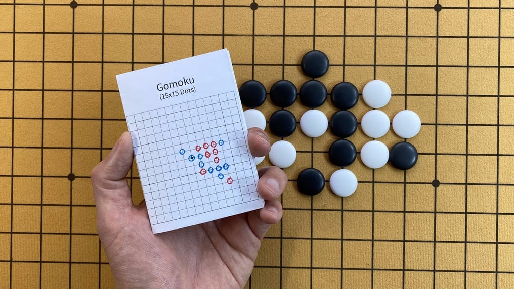 how to play gomoku